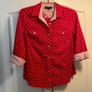 Women’s red and white polka dotted button up